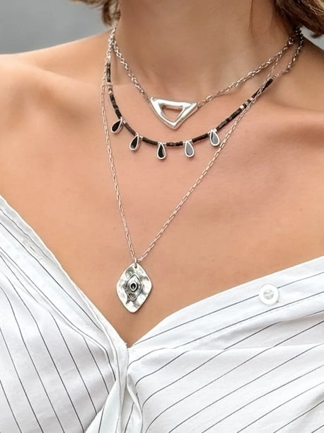 Ensemble de colliers superposés en argent, pendentifs en chaînes d'acier